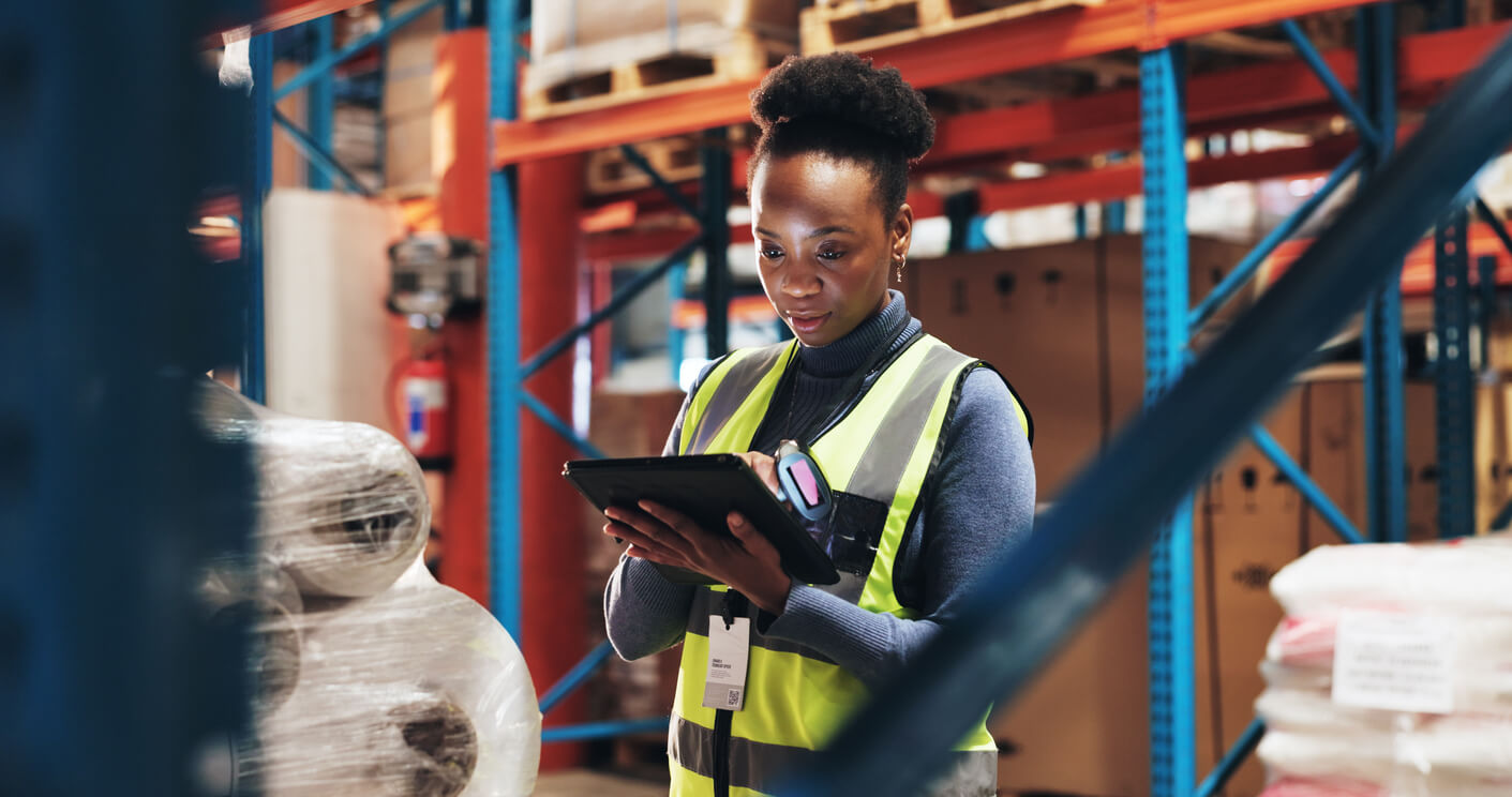 Staff checking inventory and checklist with tablet in logistics for stock control, distribution or inspection at warehouse