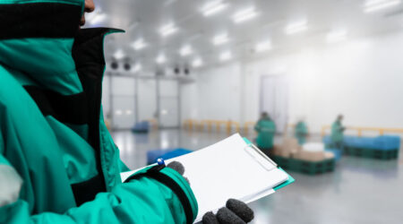 Warehouse worker with clipboard